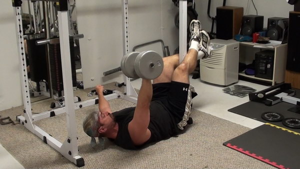 Killer MMA-Style Core, Adductor and Chest Exercise...Feet Anchored One-Arm Dumbell Floor Press 