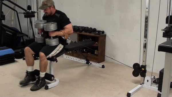 Dumbells on thighs for Cable Dumbell Bench Press for Maximum Chest Tension and Pec Mass