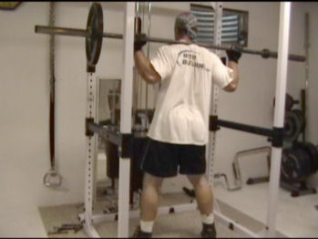 One Side Loaded Barbell Squats For Hitting The Core With Unbalanced Resistance 